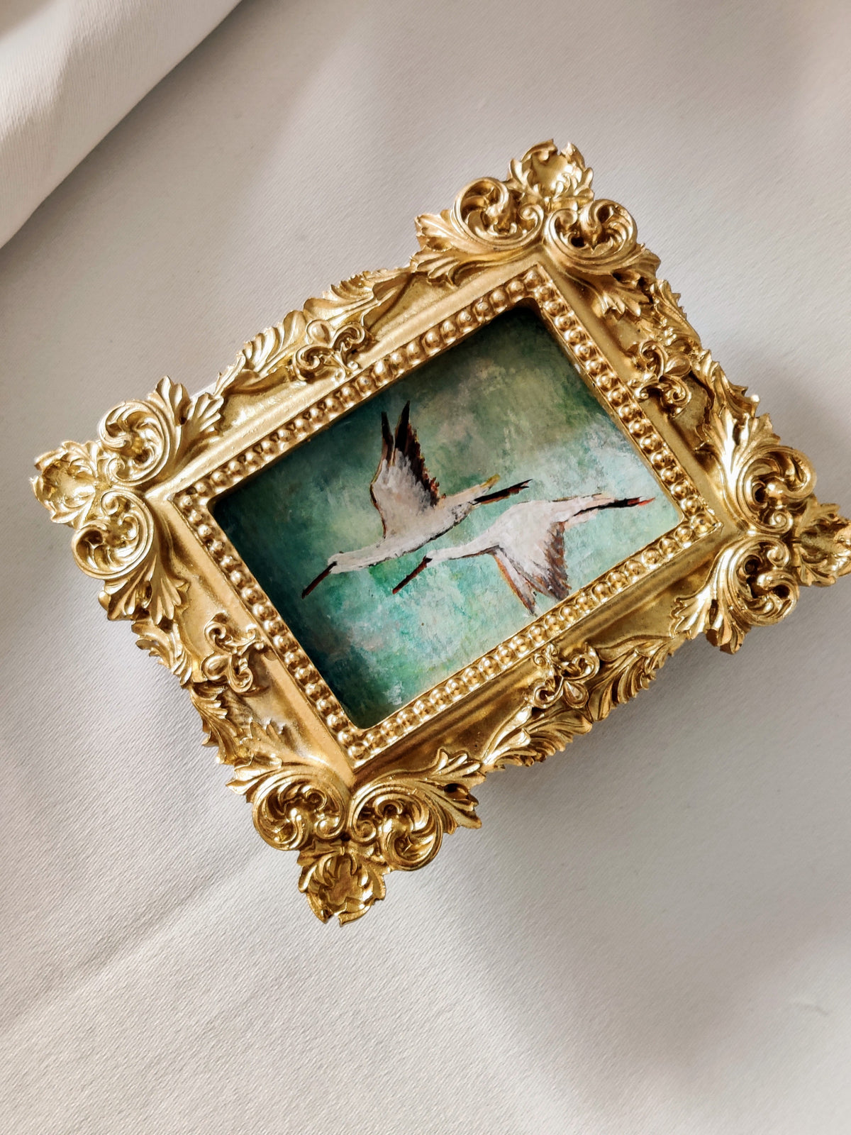 Flying storks at mid day light | Framed Original