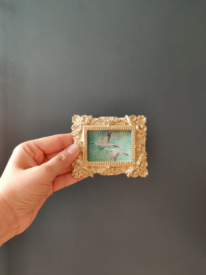Flying storks at mid day light | Framed Original