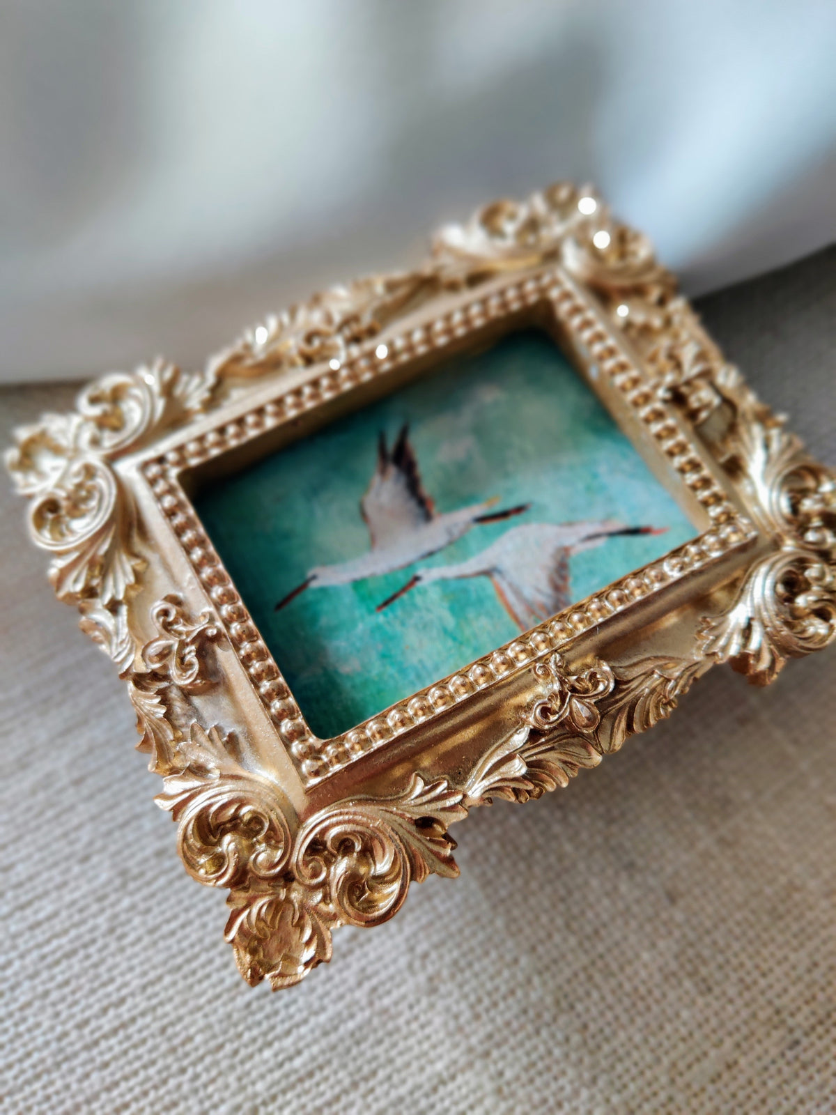 Flying storks at mid day light | Framed Original