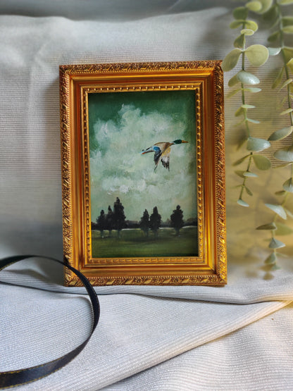 Wings of reflection - flying duck