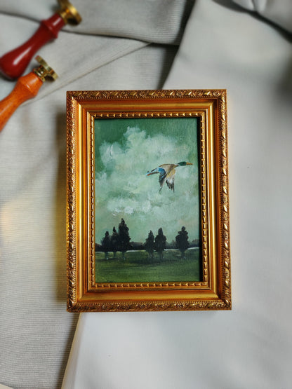 Wings of reflection - flying duck